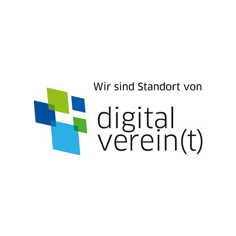 Eine weiße Fläche mit dem Schriftzug "Wir sind Standort von digital vereint". Links neben dem Schriftzug fünf verschieden große Rauten in dunkelblau, hellblau und grün.